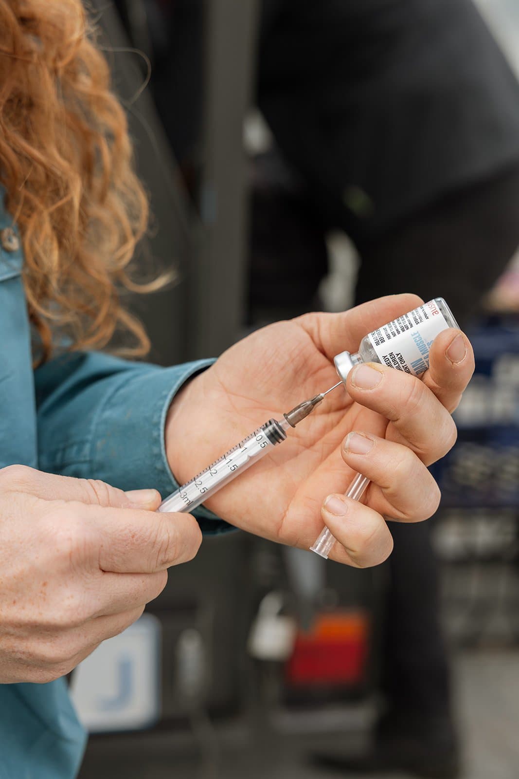 Preparing an injection during a wellness visit